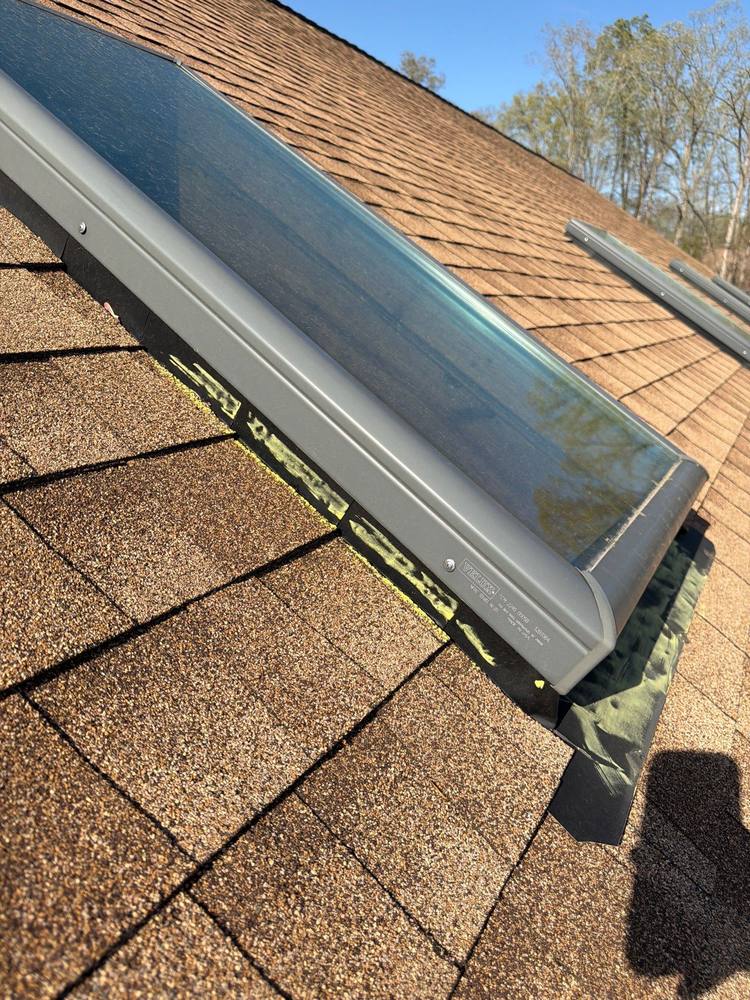 Hail impacts on skylight cladding and flashing marked with chalk, Virginia storm inspection